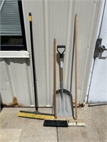 Brooms and plastic shovel