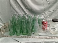 21 Harve de Grace Coca Cola bottles,  glass