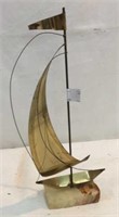 Metal Sailboat Art Nestled In Stone V12E