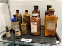 10 Antique Pharmacy Bottles 5 W/Corks.