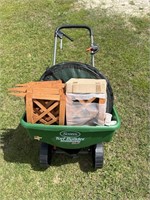 Seeder, two wooden planters 
Two lawn bags