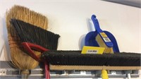Assorted brooms and dust pans, all to go