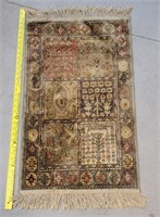 Small Oriental throw rug