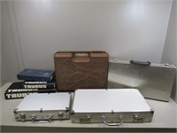 (4) Hard sided handgun or utility cases and (3)