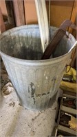 Old galvanized, trash can with the contents