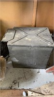 Large antique metal storage box filled with extra