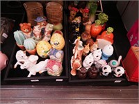 Two trays of figural salt and pepper shakers,