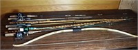 5 reels and rods plus recurve bow; as is