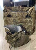 Cabella brand hunting blind and a bag of