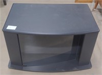 (I) Particle Board TV Stand. W/ Glass Doors. 33"