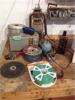 Barn lantern, radio, electric fence wire,