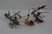 Three Toy Helicopters One is Hand Made out of Spar