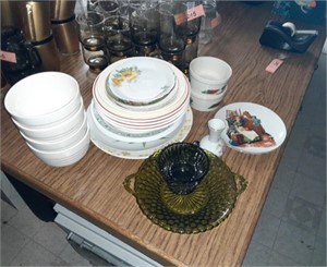 Variety of plates bowls and serving dishes and a