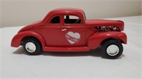 1/25 scale We Care car piggy bank.