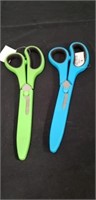 Two scissors  with gards