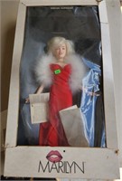 Marilyn Monroe Doll in red dress, boa