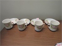 hand painted cups and saucers