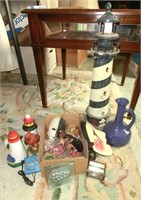 lighthouses, blue pottery carafe, ceramic masks,