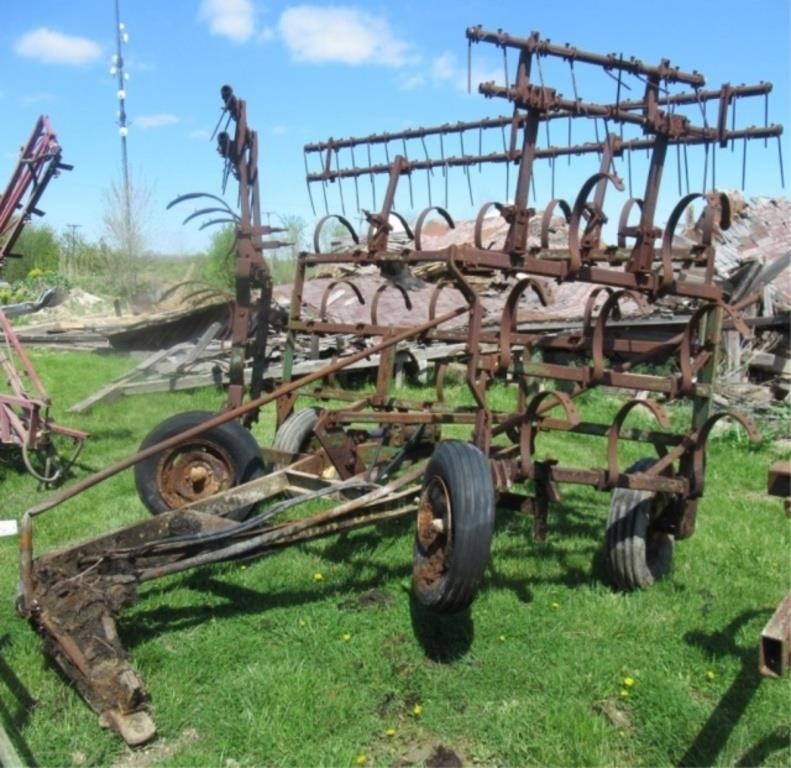 John Deere 3 section field cultivator with spring