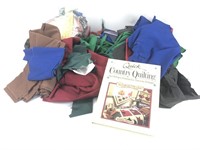 Box lot of quilt fabric and quilt book.  FULL