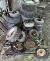 Pile of miscellaneous riding mower tires, push
