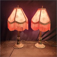 2 matching metal lamps with pink satin shades