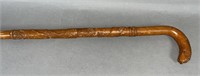 Folk art carved walking stick attributed to
