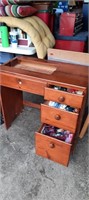 Old sewing cabinet  w/sewing items, w/ drop leaf