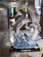De Cope Dolphins figurine display