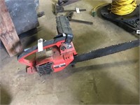 Red Homelite Chainsaw
