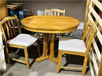 modern small oval oak table & 3 chairs