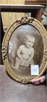 Oval baby photo  in frame 23x17