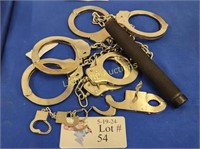 FIVE PAIRS OF HAND AND LEG CUFFS
