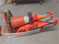 tub of safety cones and signs