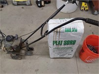 bag of peat sorb and Craftsman cultivator