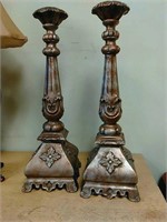 Pair pillar style candle holders