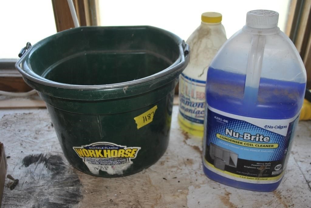 bucket with new condenser coil cleaner and ammonia