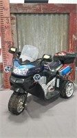 Motorized plastic trike(black) w/ charger,untested