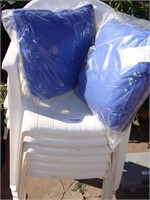 Six Plastic Lawn Chairs with 5 blue pillows
