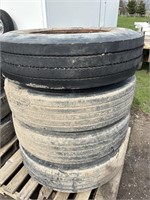 Four tires with rims: 11 R22.5