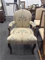 Tan and blue upholstered armchair