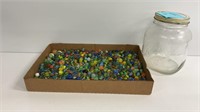Large jar of marbles, regular and cat eye with