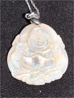 Mother of pearl Buddha hand carved pendant on