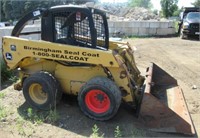 2000 John Deere wheel skid loader has hand and