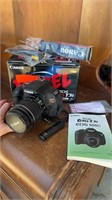 Canon rebel EOS T3I camera plus handheld clicker