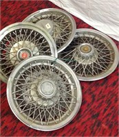 F6) FOUR OLD STYLE HUBCAPS