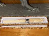 Carved Letter Opener needs reglued (living room)