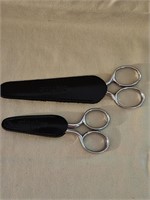 TWO PAIR GINGHER SCISSORS WITH LEATHER SHEATHS