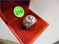 STERLING SILVER RING WITH AMETHYST CENTER STONE -