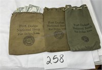 Fort Dodge national bank bags, and play money